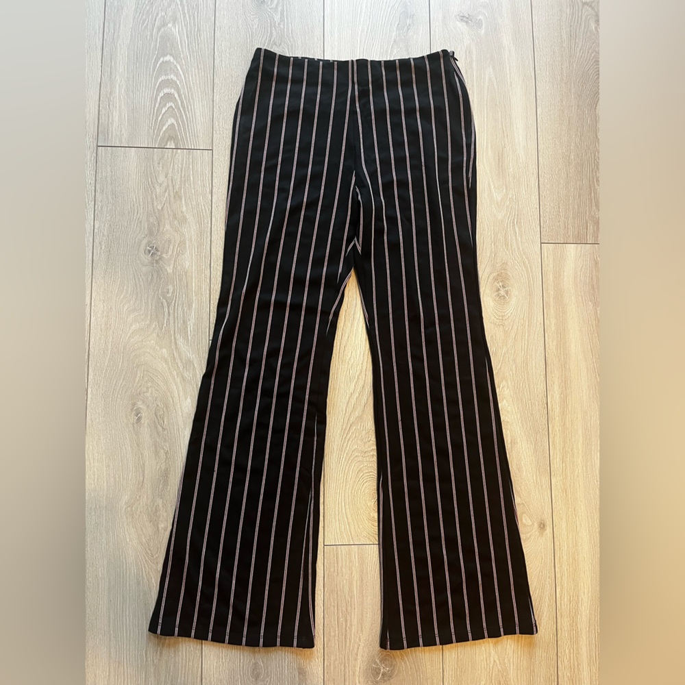 Black flare pants with red/white stripes. - Picture 1 of 4
